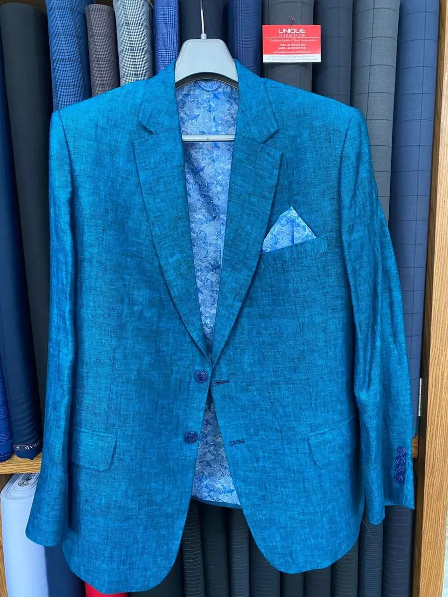 Blue textured blazer with pocket square