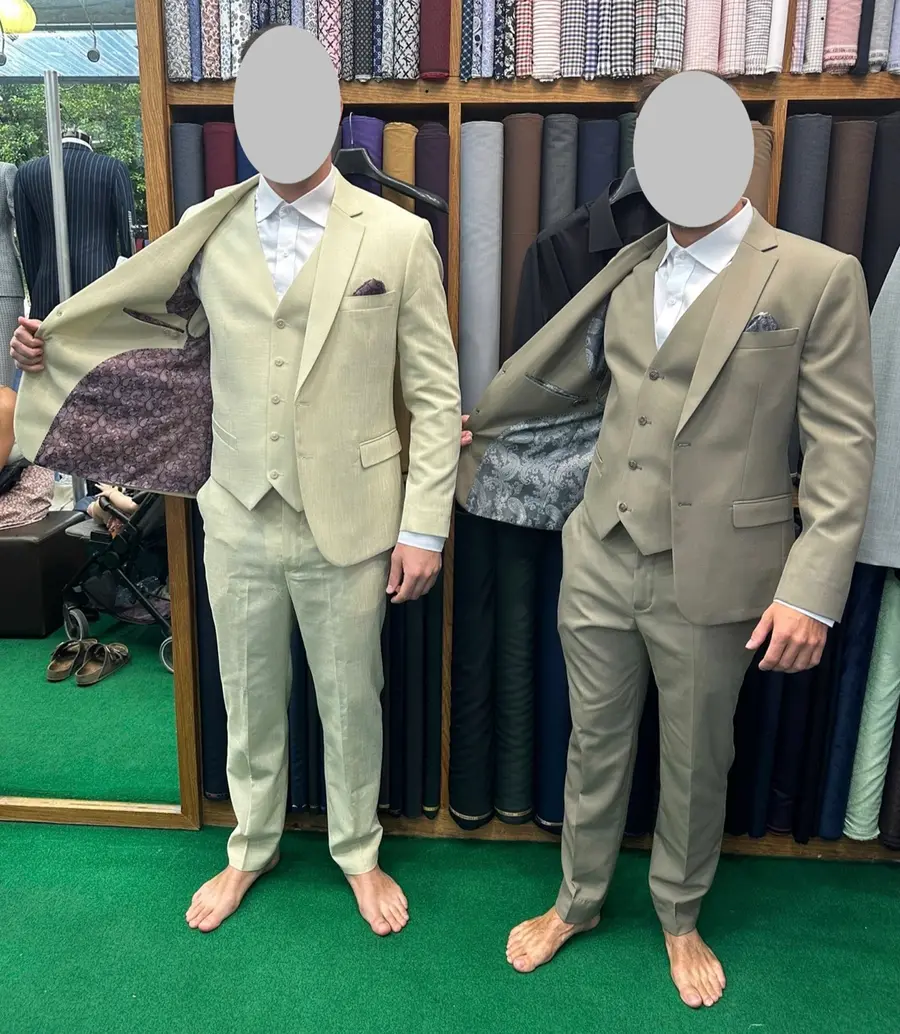 Tan three-piece suits on display