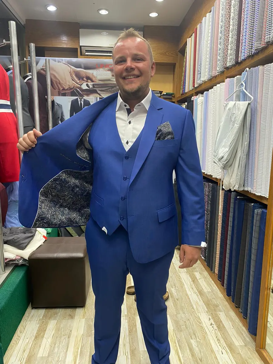 Blue three-piece bespoke suit