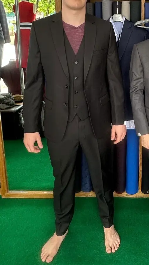 Charcoal three-piece suit