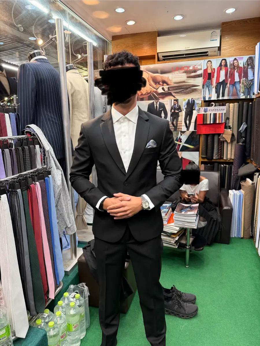 Black tuxedo with pocket square