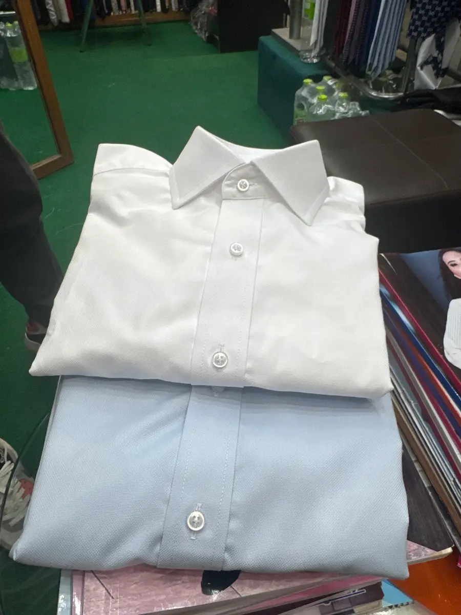 Folded white dress shirt, made to measure