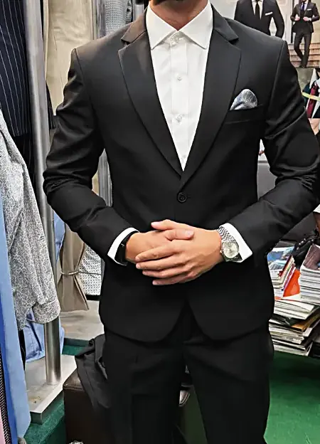 Black tuxedo with pocket square