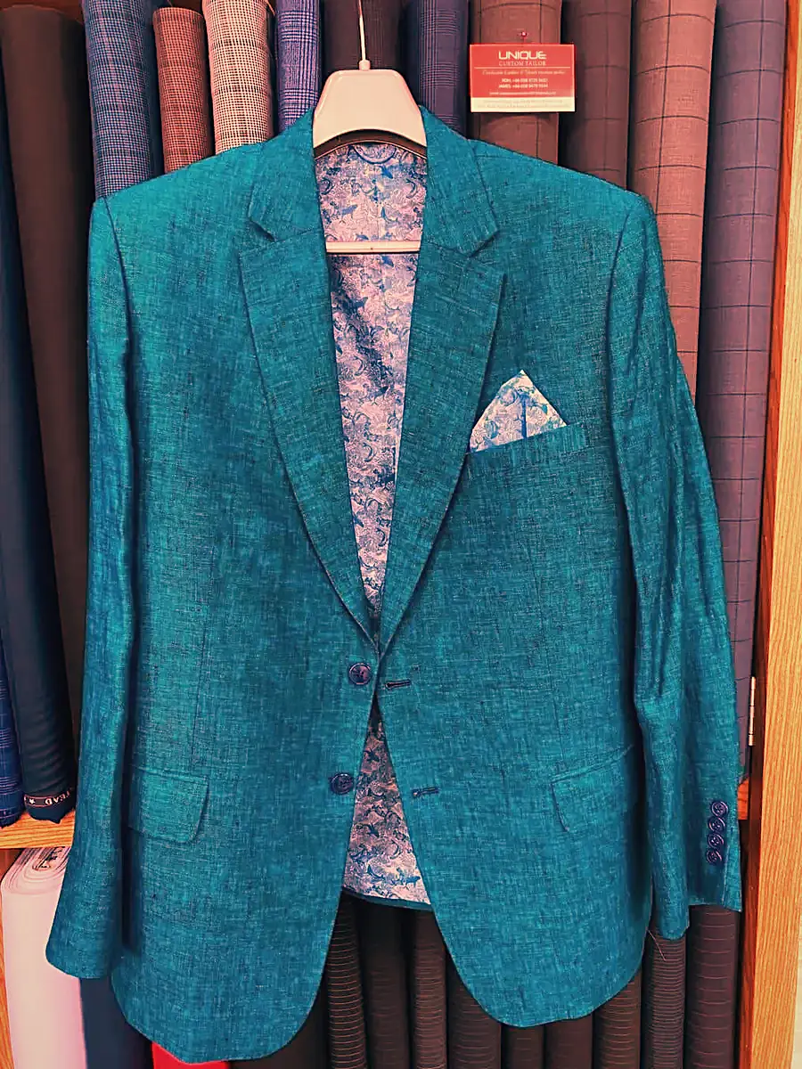 Blue textured blazer with pocket square